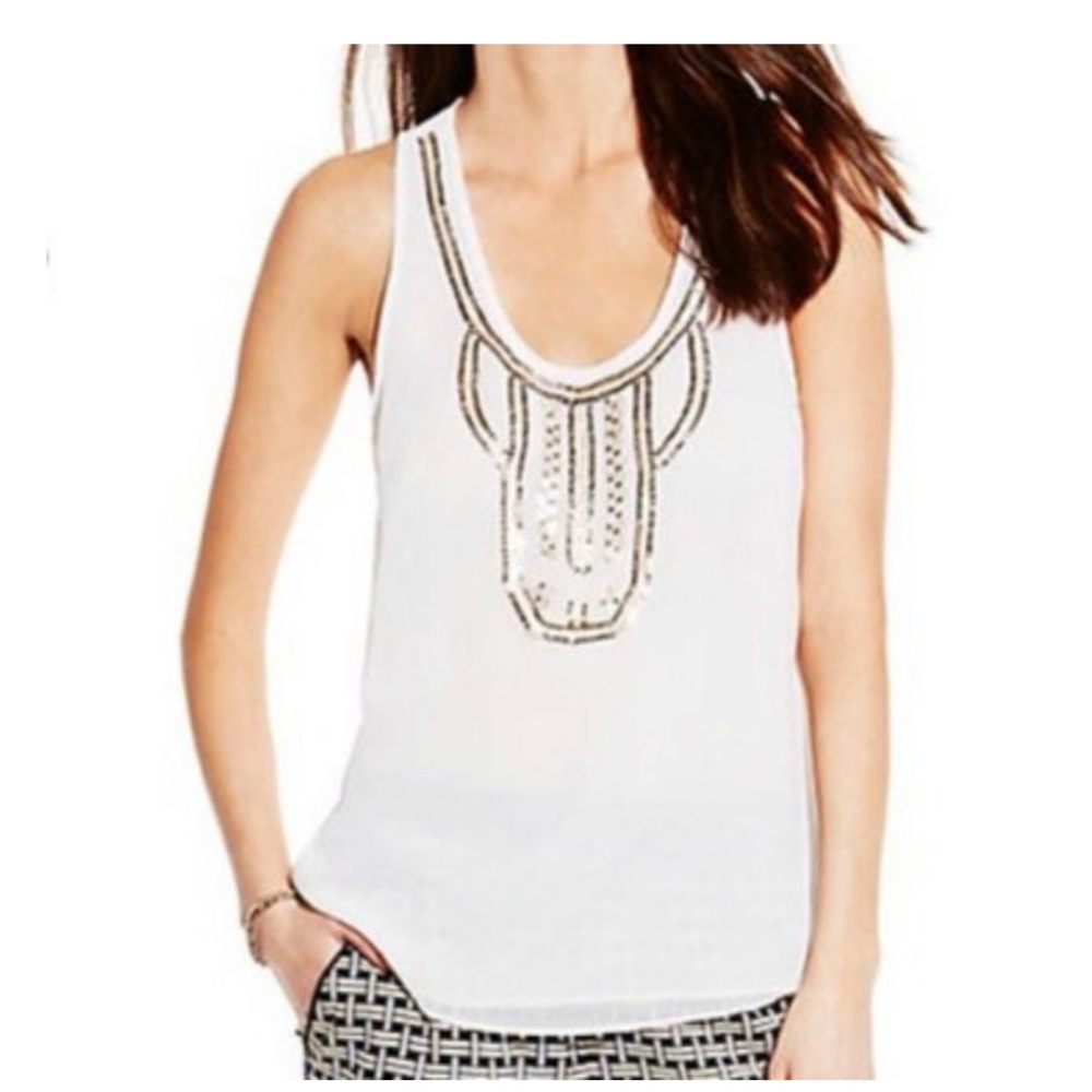 Vince Camuto White Sparkly Blouse
Size: 12 (L)